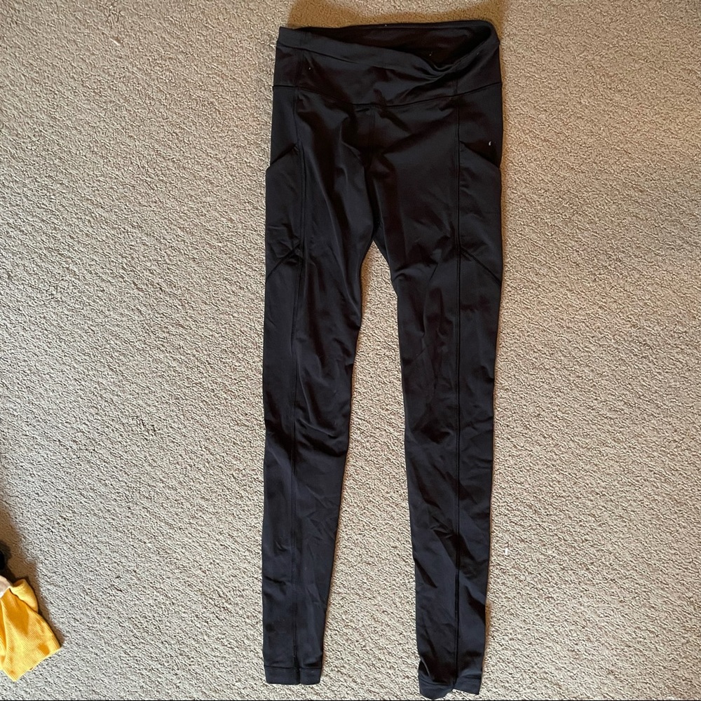 Black lululemon leggings with mesh on back of legs